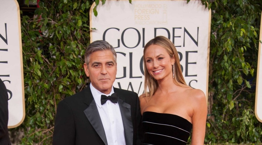 George Clooney in Stacy Keibler, oba Armani (foto: Profimedia)