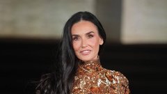 Demi Moore zlata obleka Gucci teden mode Milano