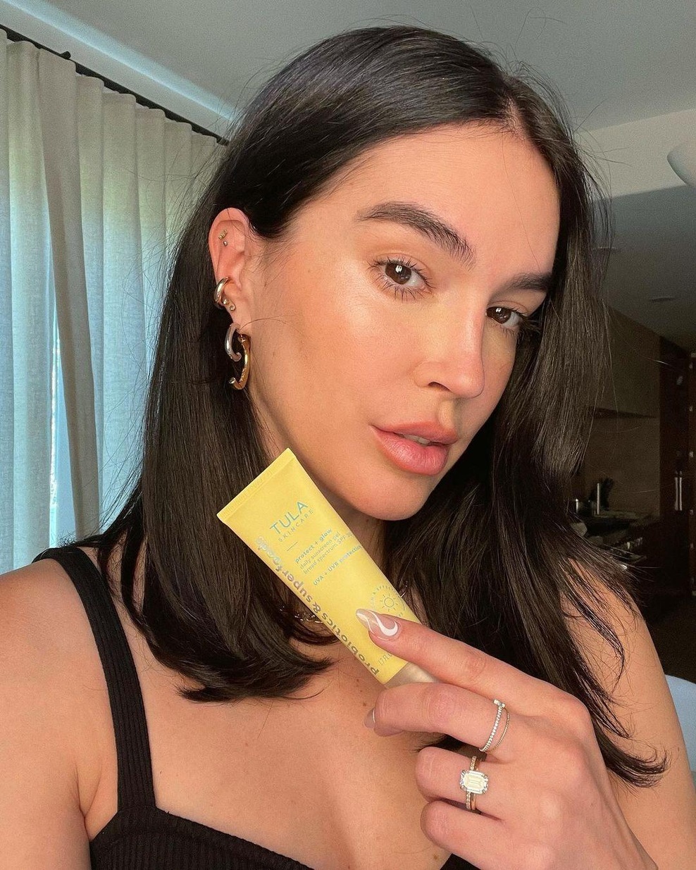 Najboljše sončne kreme za obraz, ki izboljšajo videz kože in ne puščajo belih madežev (foto: Profimedia)